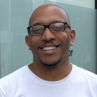 Herve Mezence RMT Headshot 2026